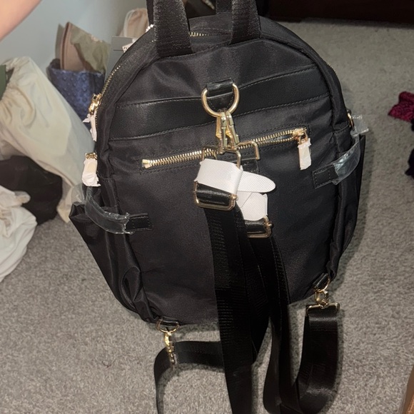 Sleek Black Backpack with Gold Zippers - Picture 3 of 10